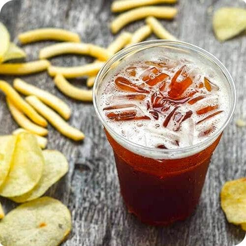 Chips crisps and drink on table