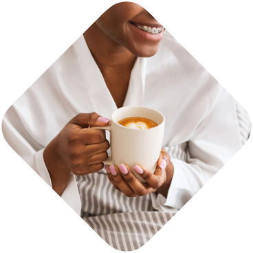 Young woman drinking coffee
