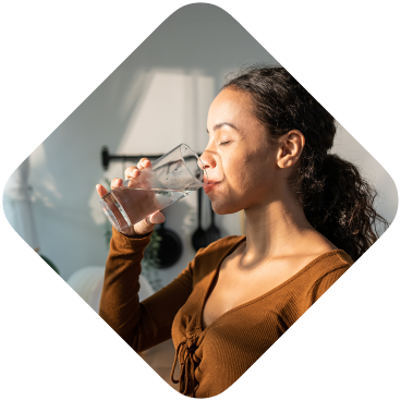 Woman drinking a glass of water